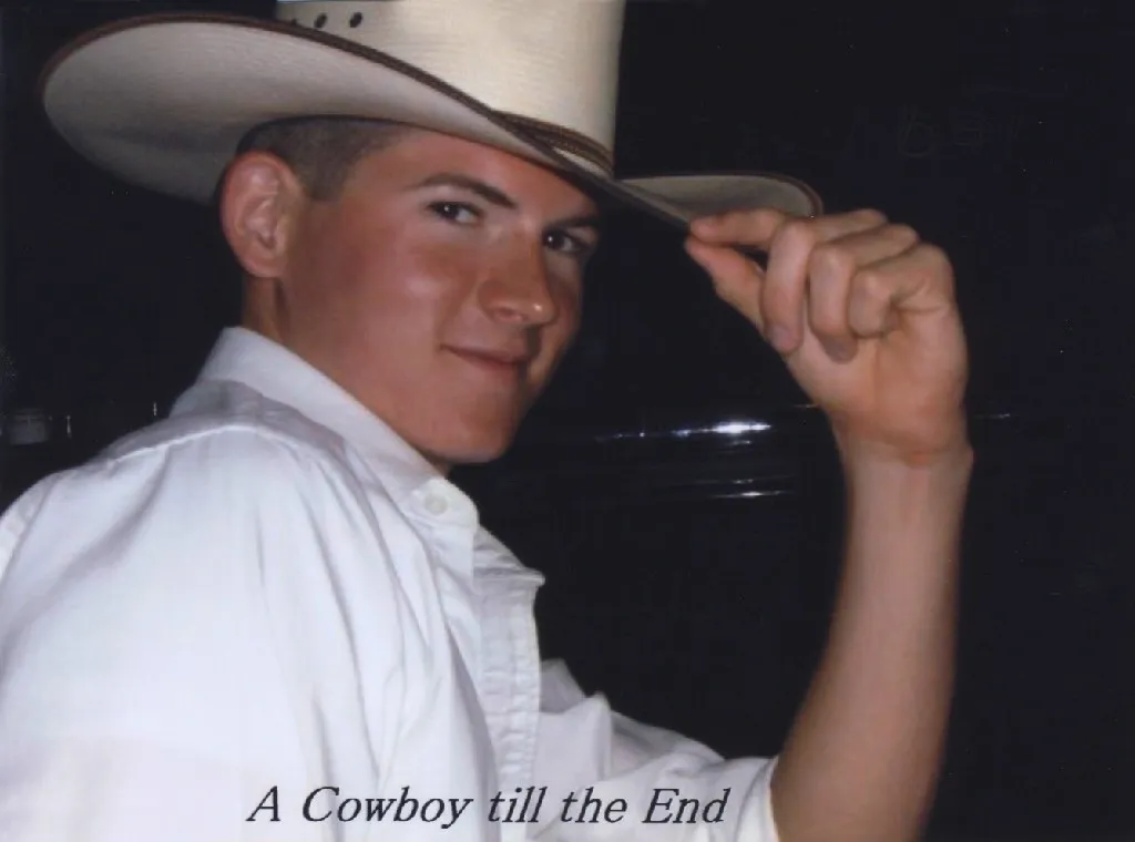 A cowboy with a hat on and the caption " a cowboy till the end ".