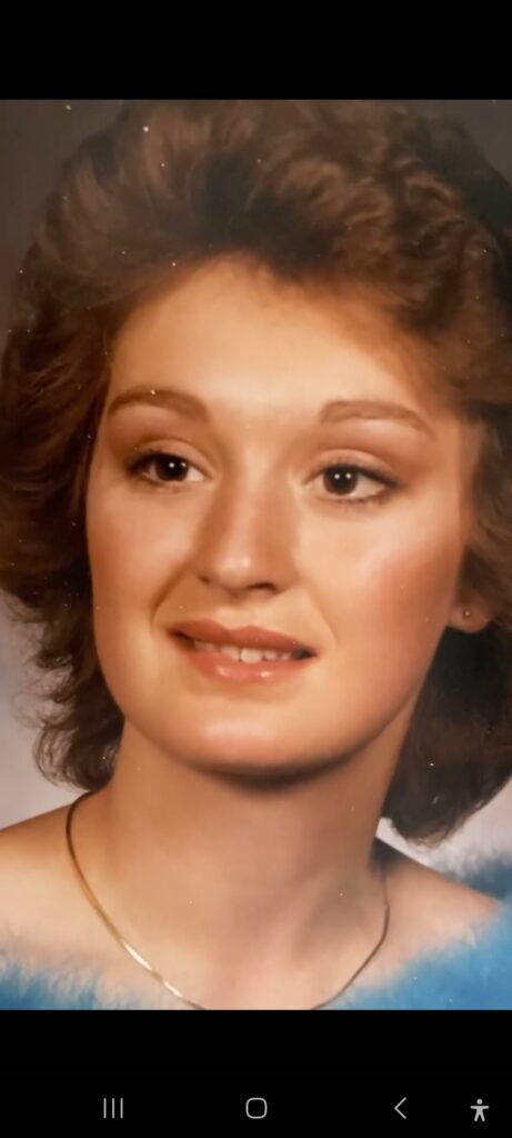 A close up of a person with long hair