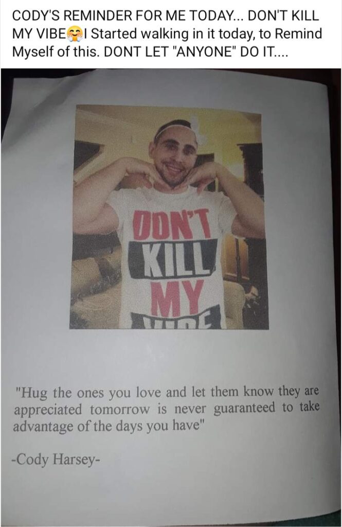 A picture of a person wearing a t-shirt with the words " don 't kill my vibe ".