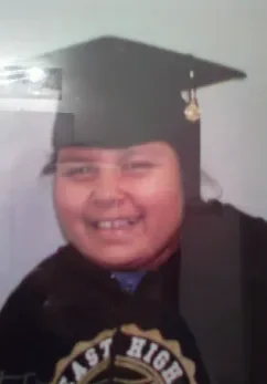 Alma Ugalde A young person wearing a graduation cap and gown.