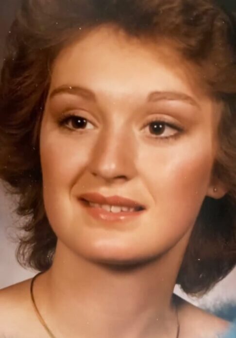 A close up of a person with long hair