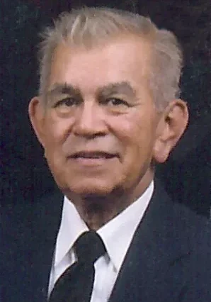 Raymundo V Gonzalez, Sr A man in a suit and tie.